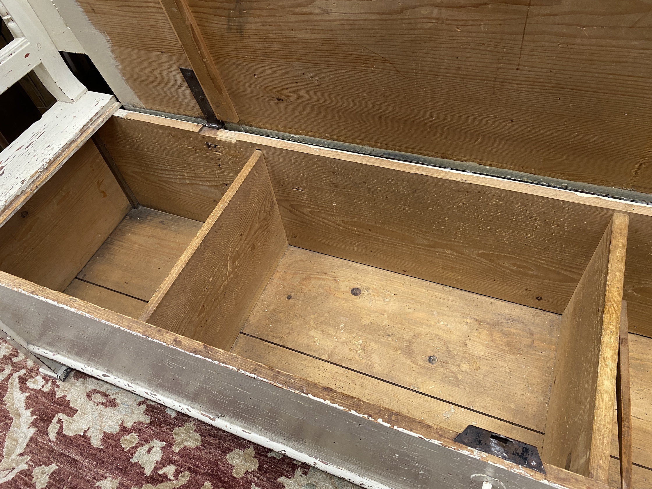 A 19th century East European painted pine settle with hinged box seat, length 234cm, depth 53cm, height 100cm
